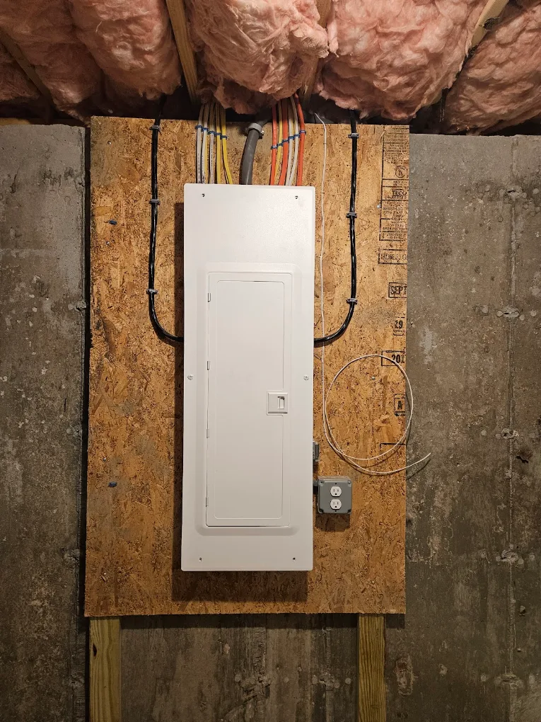 New electrical panel installation with clean wiring