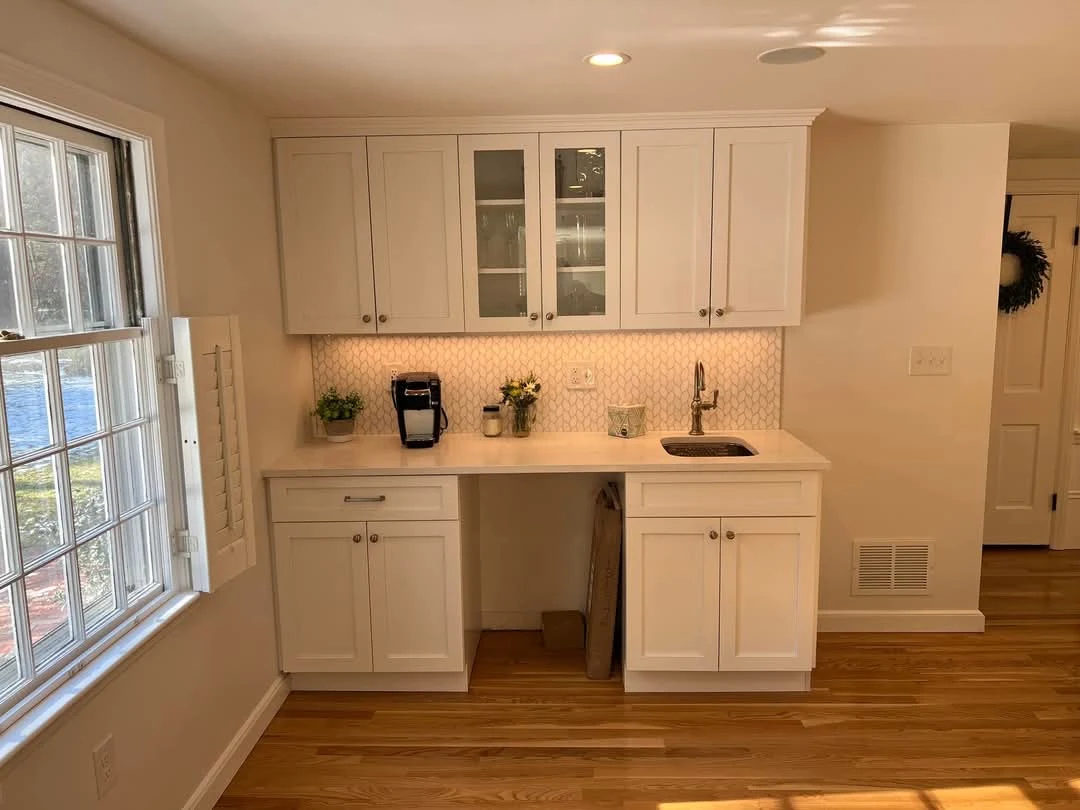 Built-in bar area with under-cabinet lighting